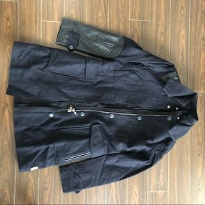 Handstich coat with leather detail